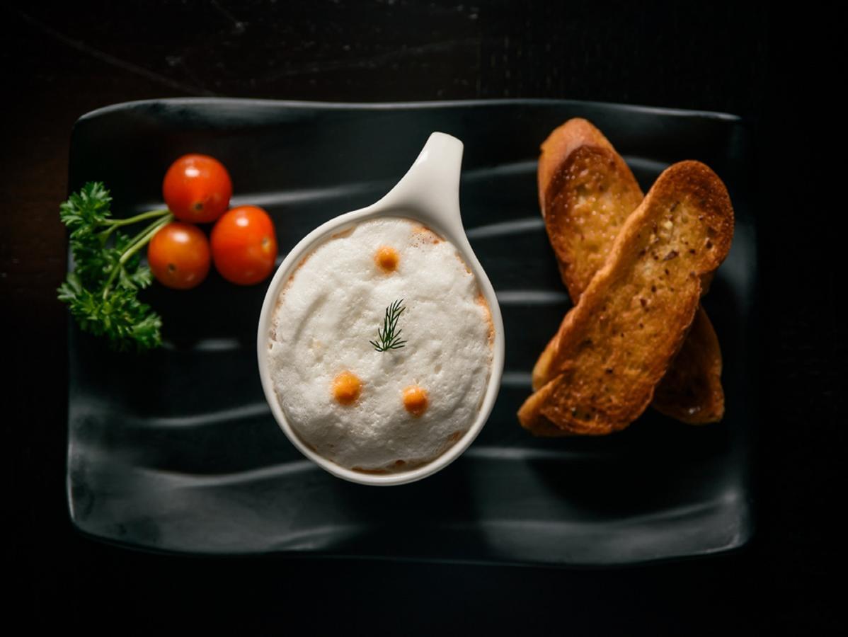 The Concord Hotel & Suites Nairobi Zewnętrze zdjęcie A bowl of cheese sauce with croutons